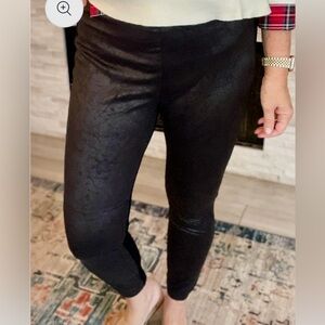 Stylish Black Leggings with “leather like” details.